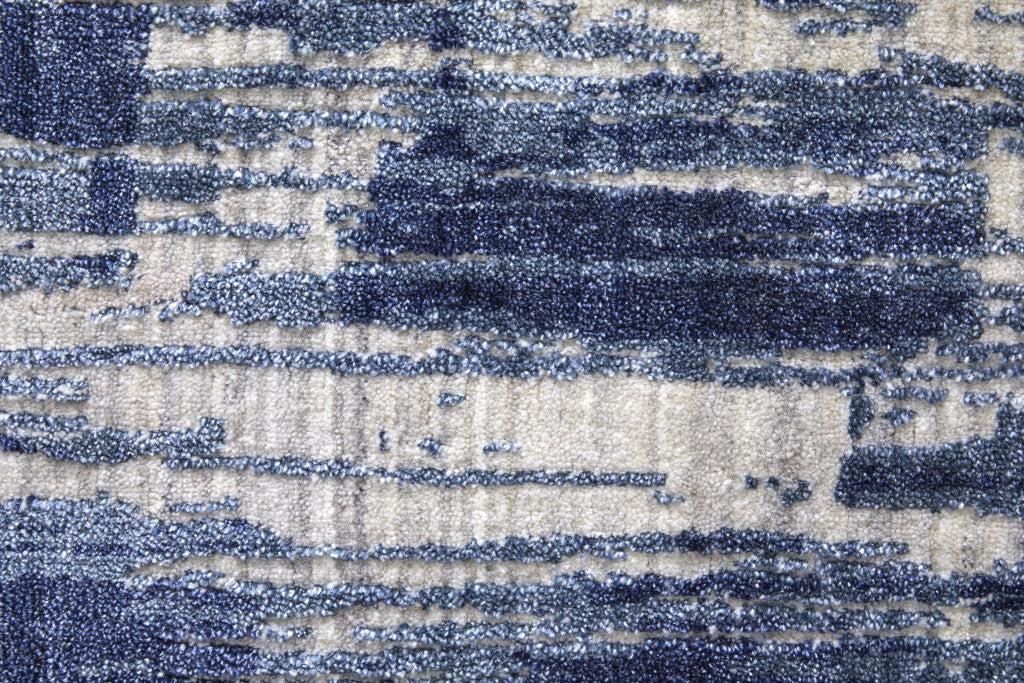 5' X 8' Blue and Ivory Abstract Hand Woven Worn Faded Area Rug