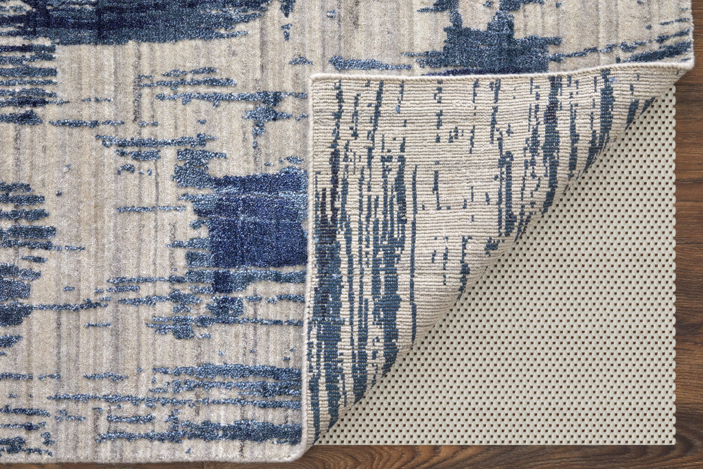 5' X 8' Blue and Ivory Abstract Hand Woven Worn Faded Area Rug