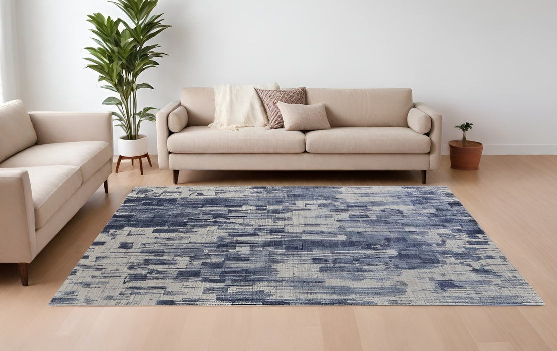 5' X 8' Blue and Ivory Abstract Hand Woven Worn Faded Area Rug