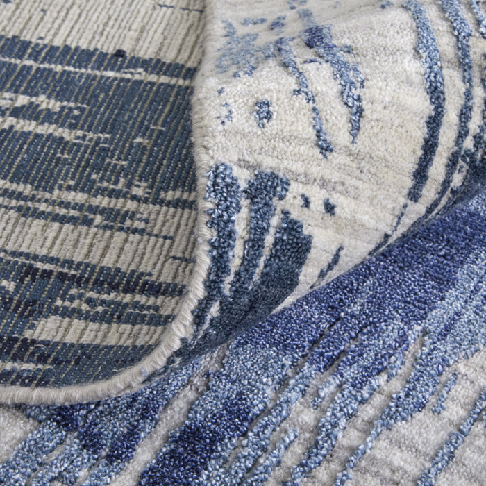 5' X 8' Blue and Ivory Abstract Hand Woven Worn Faded Area Rug