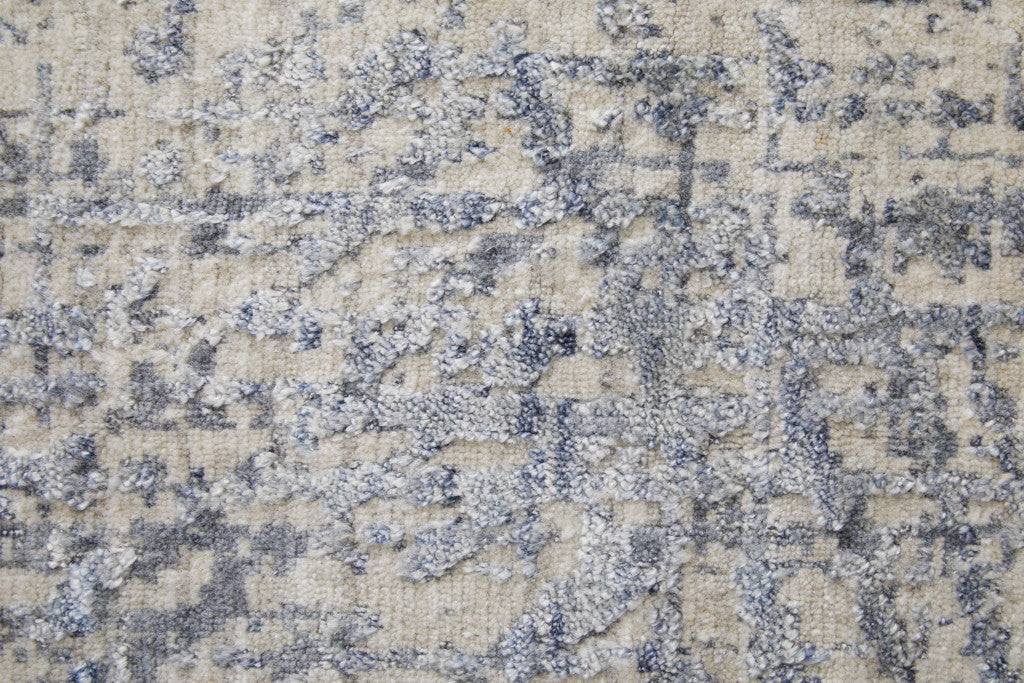 4' X 6' Gray Ivory and Blue Abstract Hand Woven Worn Faded Area Rug