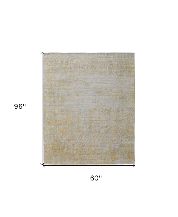 5' X 8' Yellow and Ivory Abstract Hand Woven Area Rug