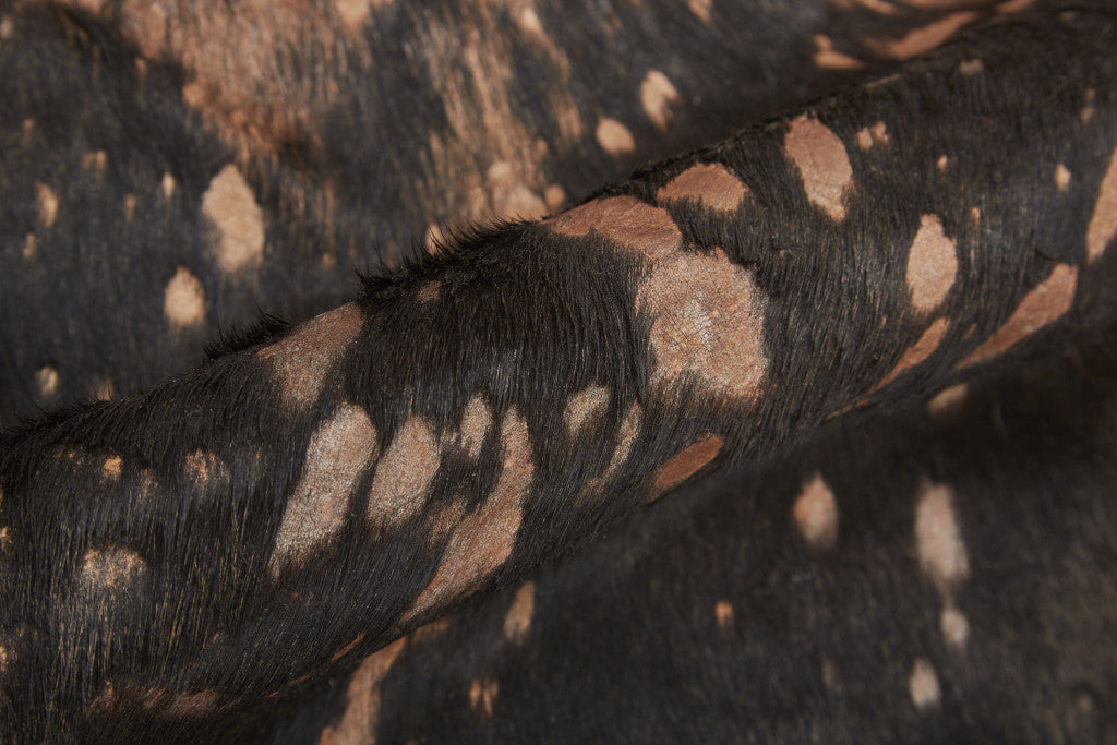 8' X 10' Brown and Tan Cowhide Animal Print Power Loom Area Rug