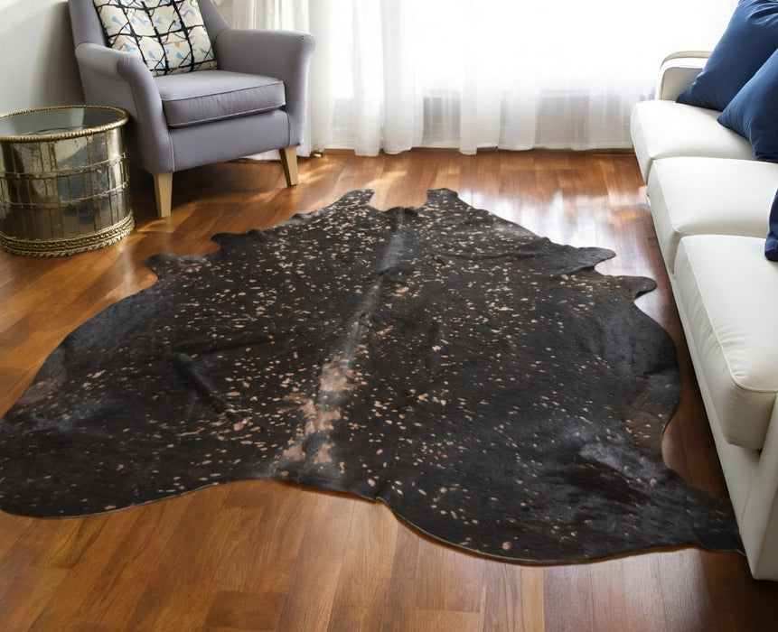 8' X 10' Brown and Tan Cowhide Animal Print Power Loom Area Rug